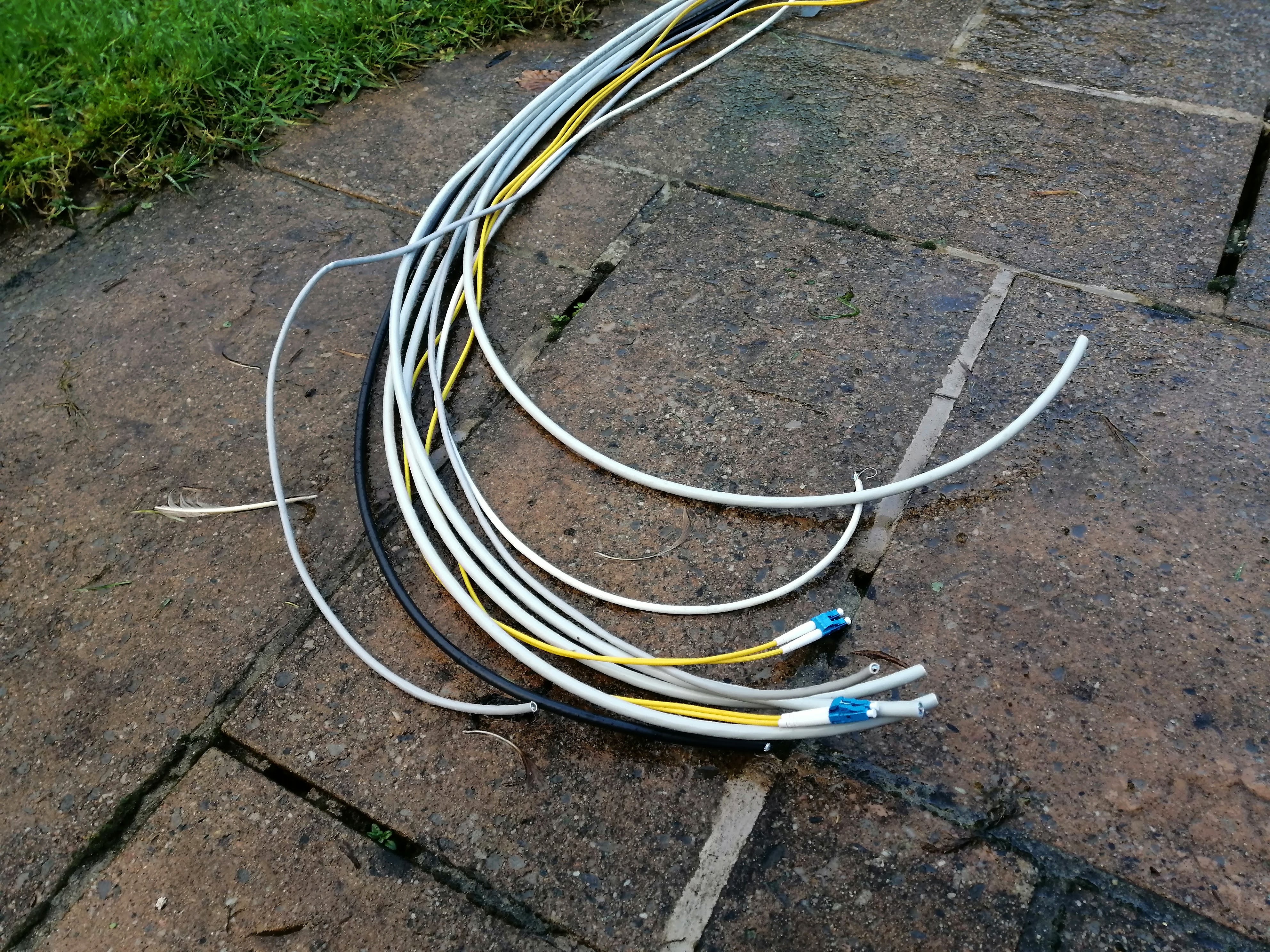 a bunch of cables and two fibre optic pairs